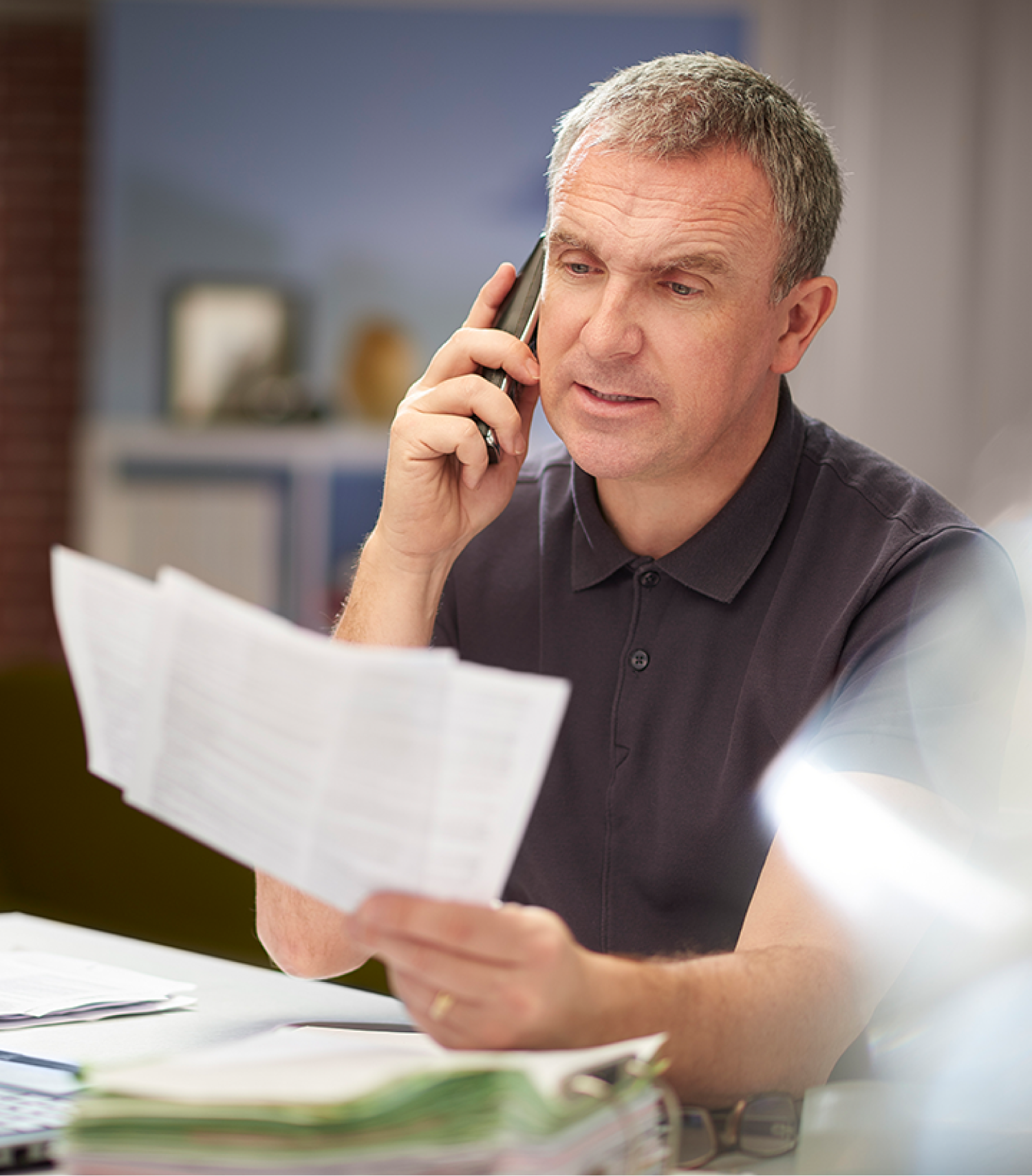 Credit union representative helping a member with financial services
